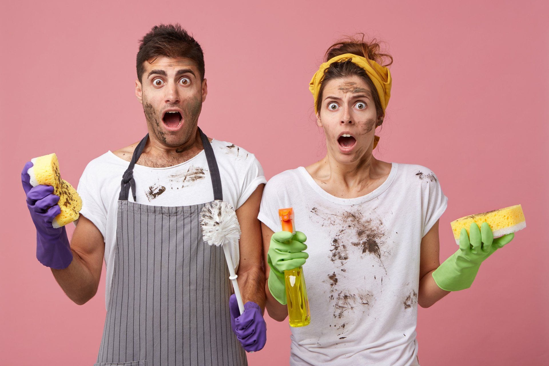 How Often Should You Clean Your Carpets? 2 man and woman covered in dirt holding cleaning supplies. how often should you clean your carpets?