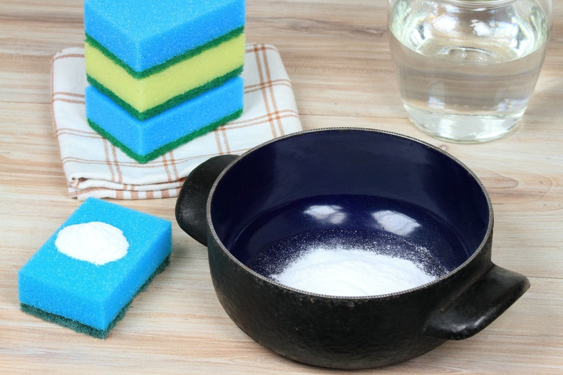 baking soda in a pot and a sponge