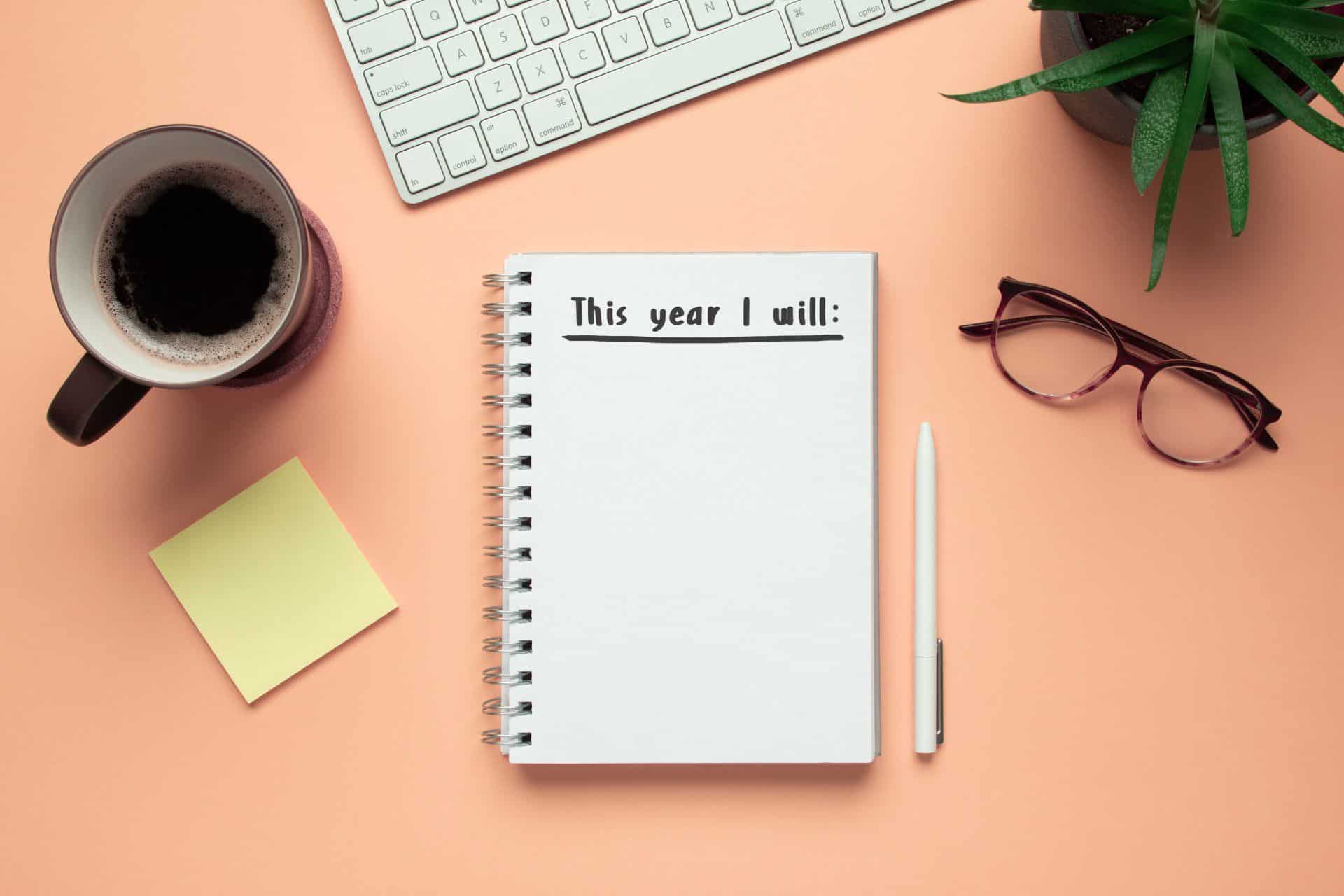 7 Cleaning Resolutions to Start Your New Year Off Right 1 a notebook that says