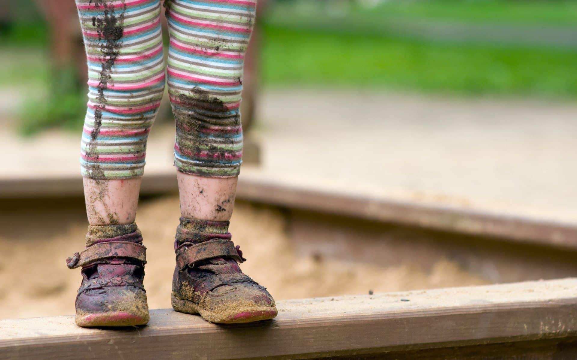 How Often Should You Clean Your Carpets? 4 muddy toddler with dirty pants and shoes