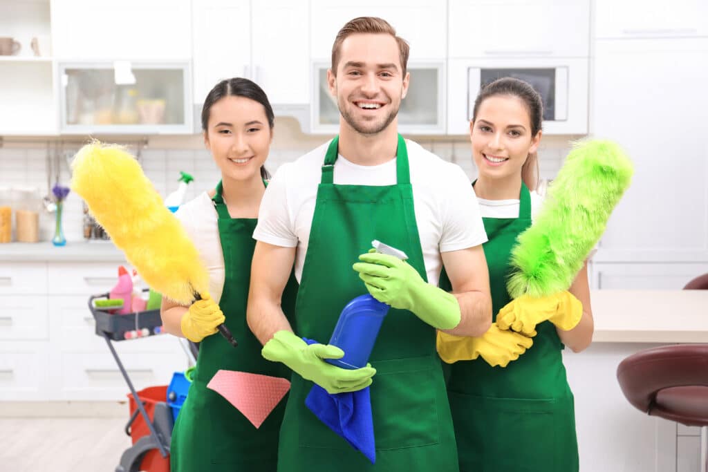 a smiling cleaning crew