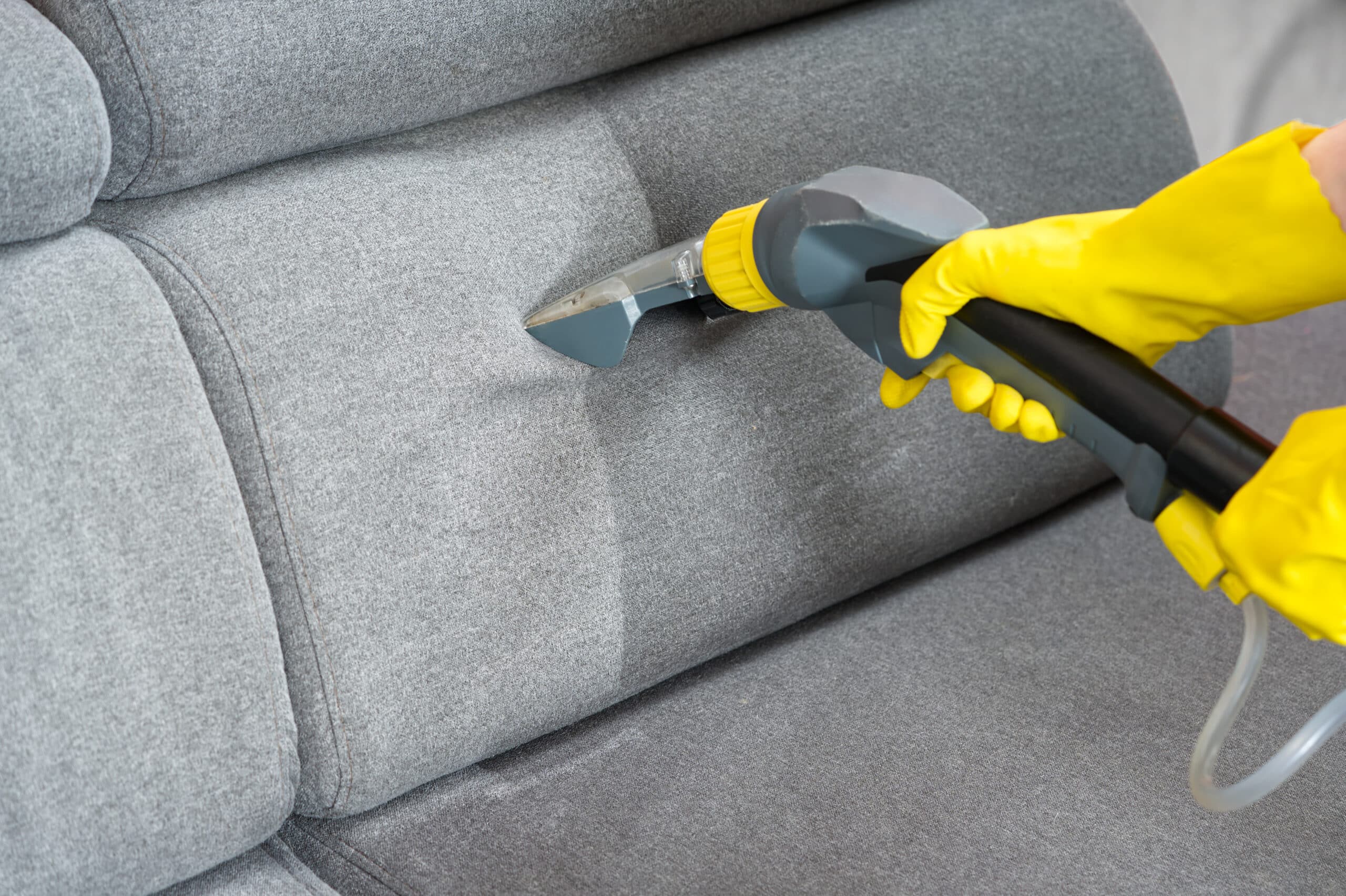 Cleaning and Maintaining Home Fabrics - Sofa before and after wet - cleaning indoors. textile sofa vacuum cleaning. professional cleaning service concept.